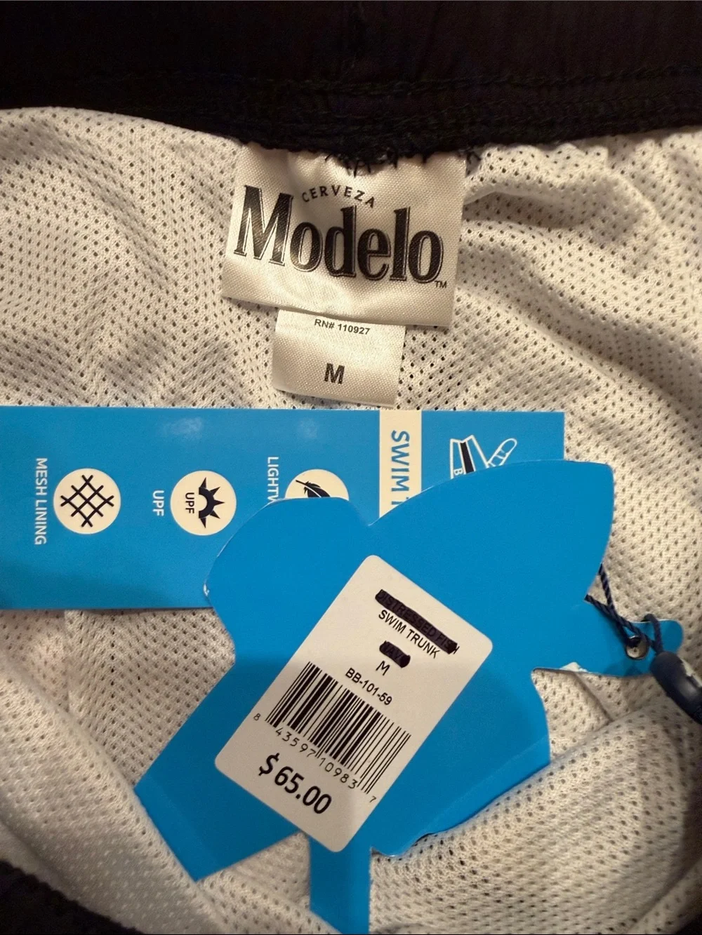 Modelo Bottle Print Men’s Swim Trunks in Black and Amber